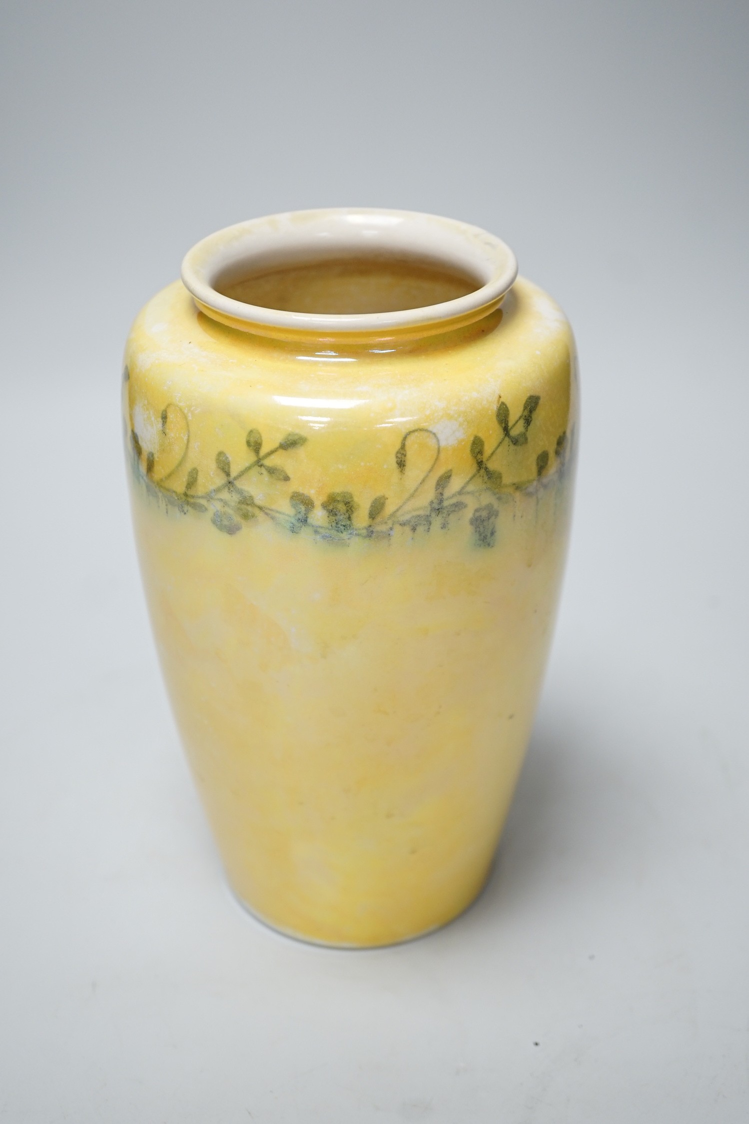 A Ruskin yellow waterglazed vase stamped and printed mark to base 1915, 21cm tall